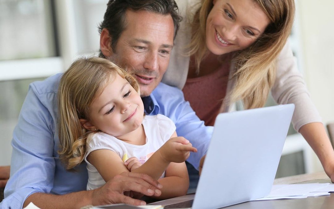 Family looking at school websites together