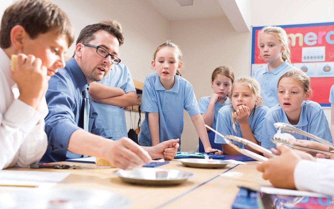 Teacher with students